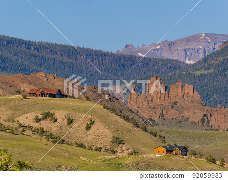 Sunny view of beautiful rural house on mountain 92059983