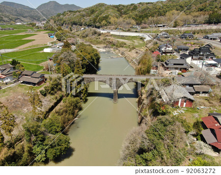 Aerial view of Mitsuhashi, the longest stone bridge in Usa City Aerial view of Mitsuhashi, the longest stone bridge in Usa City 92063272