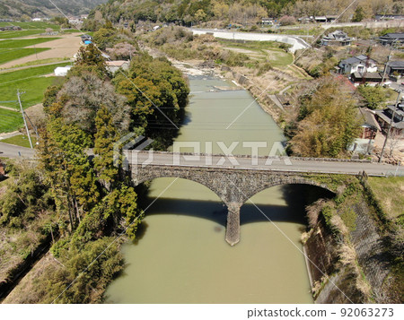 Aerial view of Mitsuhashi, the longest stone bridge in Usa City Aerial view of Mitsuhashi, the longest stone bridge in Usa City 92063273