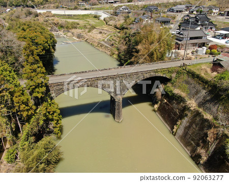 Aerial view of Mitsuhashi, the longest stone bridge in Usa City Aerial view of Mitsuhashi, the longest stone bridge in Usa City 92063277