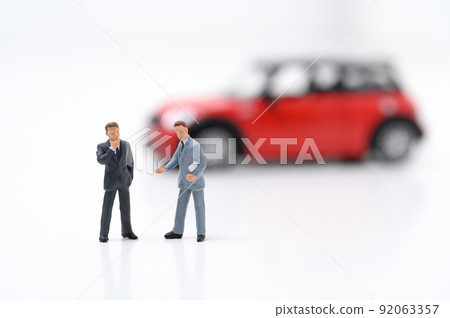 A man thinking about buying a car 92063357