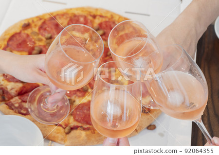 Image of toasting with a wine glass Image of toasting with a wine glass 92064355