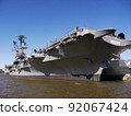 The aircraft carrier USS Intrepid moored under a clear blue sky. New York Manhattan. 92067424