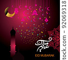 Eid Mubarak with Arabic calligraphy for the celebration of Muslim community festival. 92069318