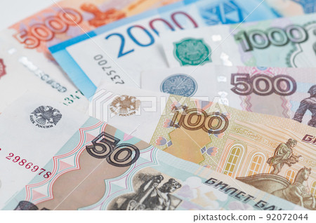 Russian rubles background. Money background and texture. Banknotes of different denominations Russian rubles background. Money background and texture. Banknotes of different denominations 92072044