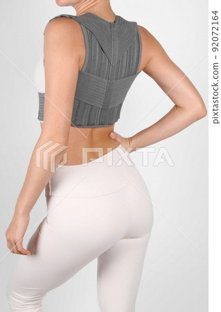 Posture Corrector isolated on white. Orthopedic lumbar support products. Lumbar Support Belts For Back Clavicle Spine. Lumbar Waist Support Belt Strong Lower Back Brace Support. Lumbar brace. Posture Corrector isolated on white. Orthopedic lumbar support products. Lumbar Support Belts For Back Clavicle Spine. Lumbar Waist Support Belt Strong Lower Back Brace Support. Lumbar brace. 92072164