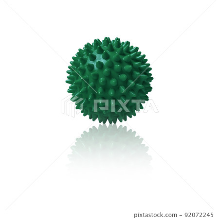 Green plastic spiny massage ball isolated on white. Concept of physiotherapy or fitness. Closeup of a colorful rubber ball for dog teeth on a white color background. Corona virus model. 92072245