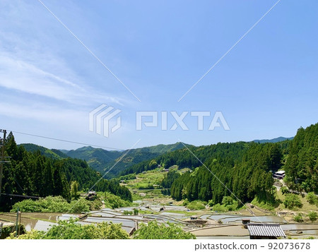 Rice terraces immediately after rice planting [Yotsuya Rice Terraces / Shinshiro City, Aichi Prefecture] 92073678