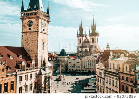Old Prague town square with Church of our Lady before Tyn, astronomical chimes. Famous historical Old Prague town square with Church of our Lady before Tyn, astronomical chimes. Famous historical 92073889