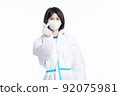 girl in a protective suit on a white background 92075981