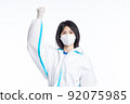 girl in a protective suit on a white background 92075985