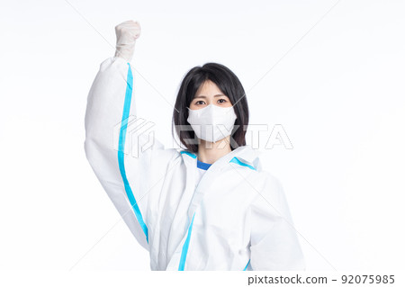 girl in a protective suit on a white background girl in a protective suit on a white background 92075985