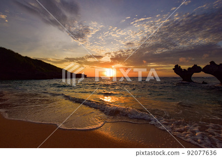 Sunset at Heart Rock Beach on Kouri Island 92077636