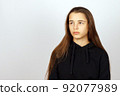 portrait of  sad young brunette girl  92077989