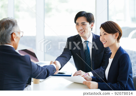 Businessman shaking hands Businessman shaking hands 92078014