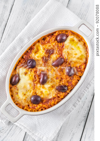 Tomato risotto with mozzarella Tomato risotto with mozzarella 92078088