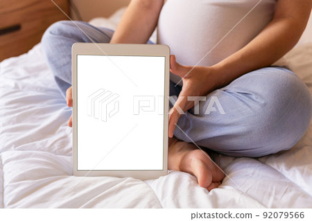 Pregnancy mockup app. Mobile pregnancy online maternity application. Pregnant mother using phone mock up. Pregnancy, medicine, pharmaceutics, health care and people concept. Pregnancy mockup app. Mobile pregnancy online maternity application. Pregnant mother using phone mock up. Pregnancy, medicine, pharmaceutics, health care and people concept. 92079566