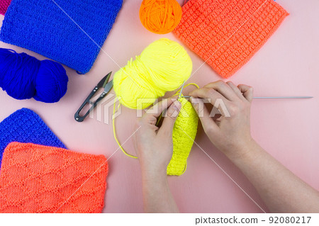 girl knits sock knitting needles. 92080217