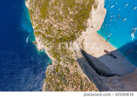 View of Navagio beach, Zakynthos Island, Greece. Vacation time. Aerial landscape from drone. View of Navagio beach, Zakynthos Island, Greece. Vacation time. Aerial landscape from drone. 92080636