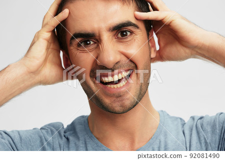 man in blue t-shirts gesture hands emotion cropped view 92081490