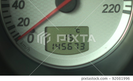Switching the display of fuel and mileage indicators on the panel in the car. Automobile panel close up. Switching the display of fuel and mileage indicators on the panel in the car. Automobile panel close up. 92081996