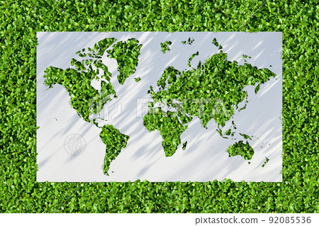 An environmentally friendly green world map that reflects the shadows of the morning sun 92085536