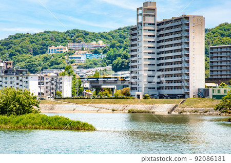 View toward Ushitashinmachi from the Kusumachi side along the main river. You can see Kandasanso and so on. Enjoy the bright suburban scenery. Hiroshima 92086181