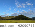 Rice fields before harvesting rice against the backdrop of mountains and sky 92090745