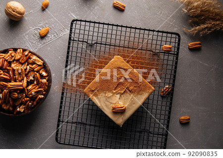 Top view on healthy sugarless cake with pecan nuts Top view on healthy sugarless cake with pecan nuts 92090835