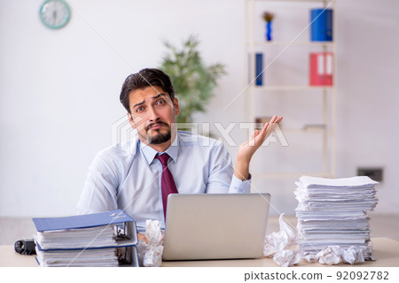 Young male employee in rejected ideas concept Young male employee in rejected ideas concept 92092782