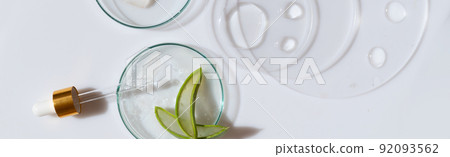 Glass petri dish with transparent pure serum for skin care Glass petri dish with transparent pure serum for skin care 92093562