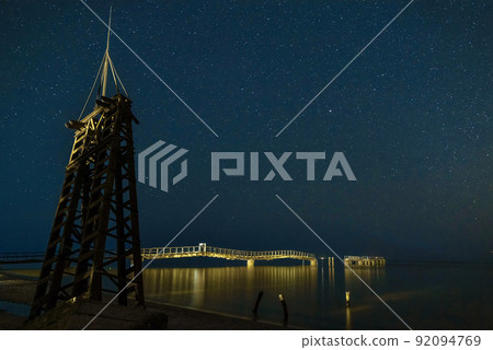 Ruined antenna near the sea at beach. Beautiful night sky. Starry night and Milky Way Ruined antenna near the sea at beach. Beautiful night sky. Starry night and Milky Way 92094769