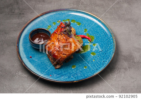 pork belly with new potatoes, tomato sauce and green butter 92102905