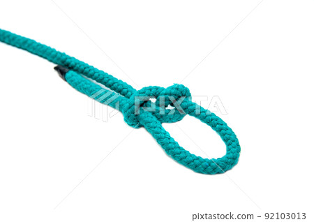Knot on a cord isolated on a white background . 92103013