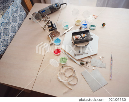 Jewelry designer workplace at home. 92106380