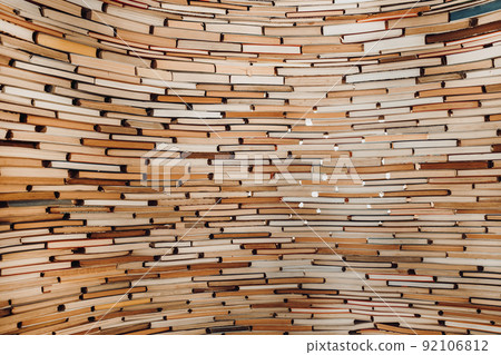 Amazing paper books background. Million volumes in natural pastel colors. Perfect texture backdrop 92106812