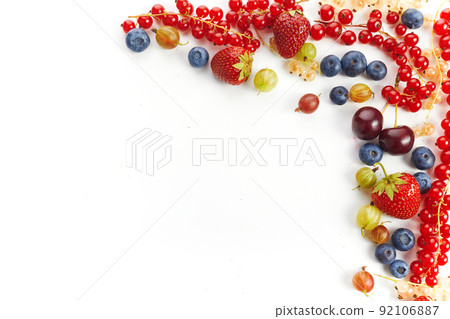 Various fresh summer berries frame on white background. Top view Various fresh summer berries frame on white background. Top view 92106887