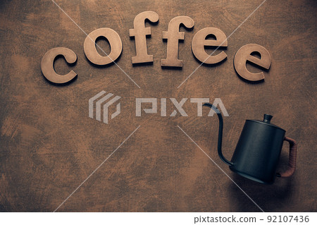 Coffee letters at abstract background texture. Coffee pot 92107436