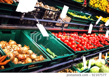 Vegetables and fruits on shelves 92107577