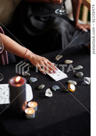 Women Practicing Runic Divination 92108474