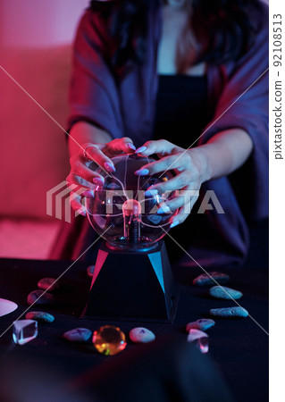 Woman Feeling Energy of Crystal Ball 92108513