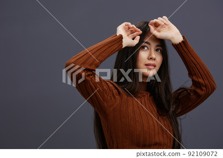 woman brown sweater glamor posing smile fashion Lifestyle woman brown sweater glamor posing smile fashion Lifestyle 92109072