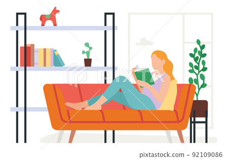 Woman reading book on sofa. Home leisure time 92109086