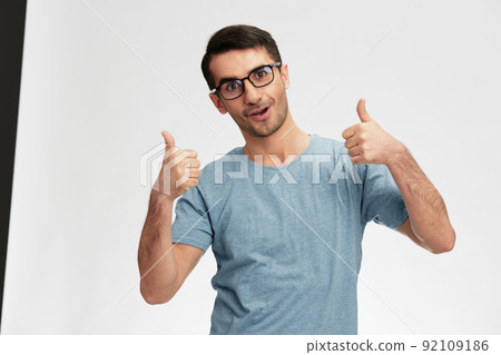 handsome man in glasses casual wear posing emotions isolated background handsome man in glasses casual wear posing emotions isolated background 92109186