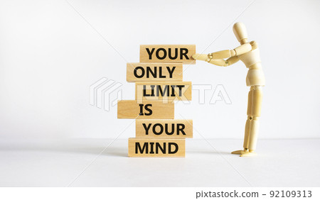 Your only limit is your mind symbol. Wooden blocks with words 'Your only limit is your mind'. Businessman model. Beautiful white background. Business, popular quotation concept. Copy space. Your only limit is your mind symbol. Wooden blocks with words 'Your only limit is your mind'. Businessman model. Beautiful white background. Business, popular quotation concept. Copy space. 92109313