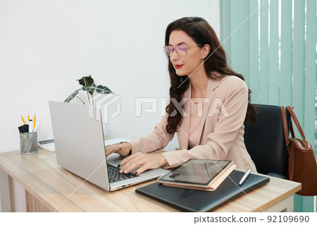 Human Resources Manager Working on Laptop 92109690