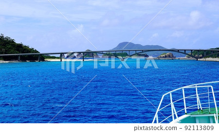 Aka Ohashi and the seascape over Aka Island and Geruma Island seen from the ferry Aka Ohashi and the seascape over Aka Island and Geruma Island seen from the ferry 92113809