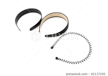 Isolated Black hair band / headband in the stuido light with white background. Isolated Black hair band / headband in the stuido light with white background. 92117295