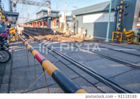 local japanese railroad tracks with home and car parking beside local japanese railroad tracks with home and car parking beside 92118188