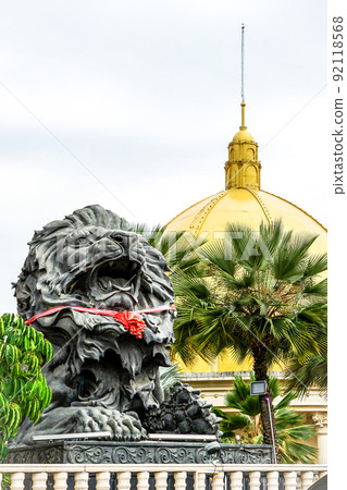 big black lion statue front of building. big black lion statue front of building. 92118568